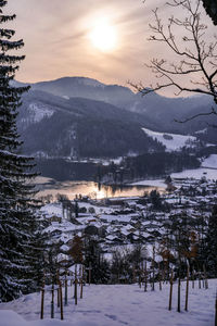 Aerial view of townscape against sky during sunset