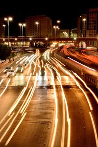 Light trails on city street at night