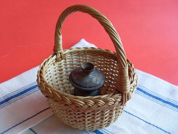 Close-up of wicker basket on table