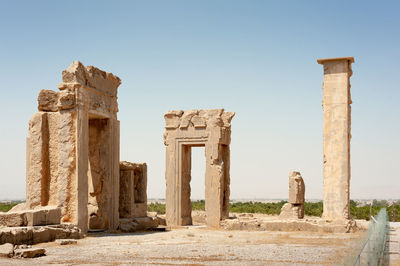 Old ruins of temple against clear sky