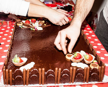 High angle view of people on table