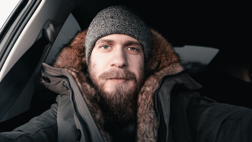 Portrait of man in park during winter