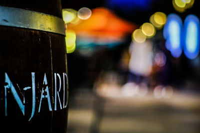 Close-up of illuminated lights at night