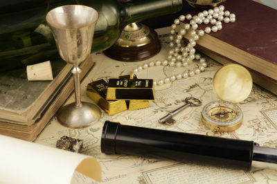 High angle view of old bottles on table