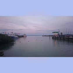 Scenic view of sea against sky at sunset