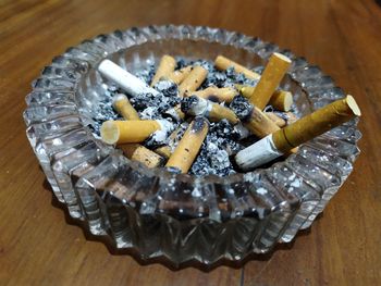 High angle view of cigarette on table
