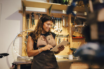 Woman standing at a store