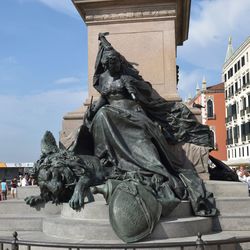 Low angle view of statue of historic building