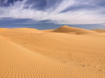 Scenic view of desert against sky