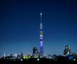 View of communications tower at night