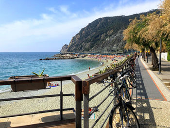 Panoramic view of city by sea against sky