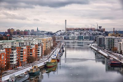 View of bridge over river in city