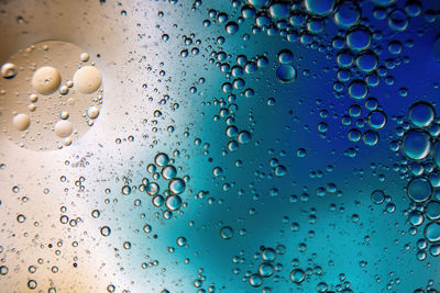 Full frame shot of water drops on glass