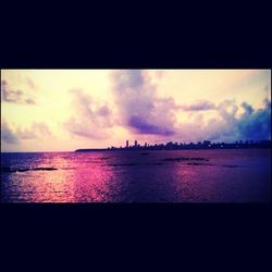 Scenic view of sea at sunset