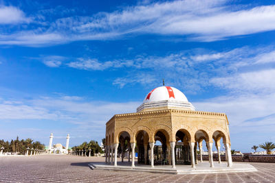 View of historic building against cloudy sky