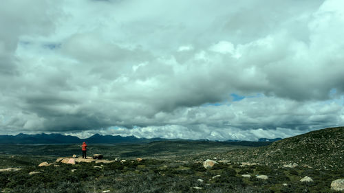 Storm clouds over field