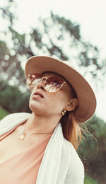 Portrait of mid adult woman wearing hat