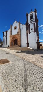 Exterior of historic building against clear blue sky