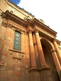 Low angle view of historical building against sky