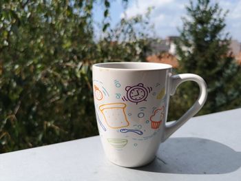 Close-up of coffee cup on table