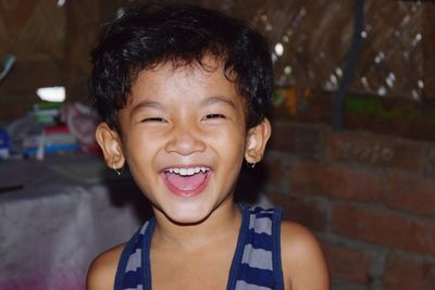 Close-up portrait of happy cute girl