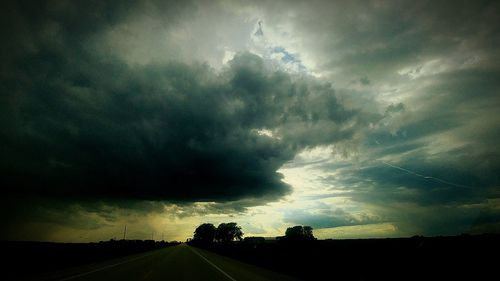 Scenic view of dramatic sky over road