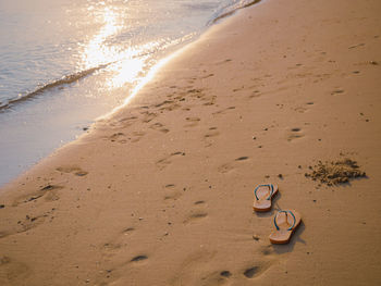 High angle view of wet sand on beach