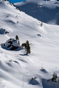 High angle view of snow covered land and mountain