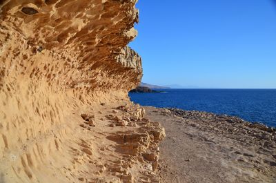 Scenic view of sea against clear sky