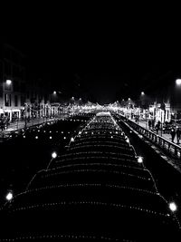 Illuminated street lights at night