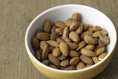 High angle view of roasted coffee in bowl on table