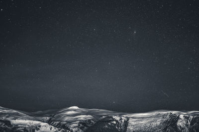 Scenic view of star field against sky at night