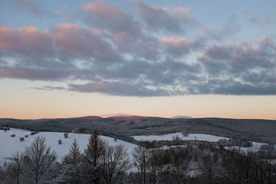 Scenic view of mountains against sky during sunset