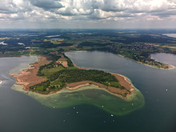 Aerial view of river flowing through city