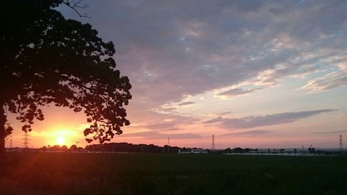 Scenic view of dramatic sky during sunset