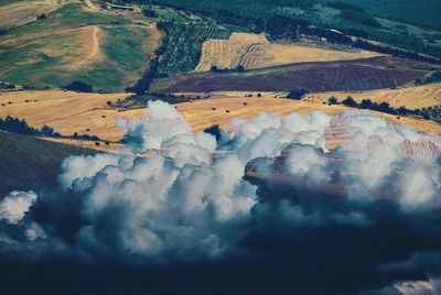 High angle view of landscape against sky, surrealism