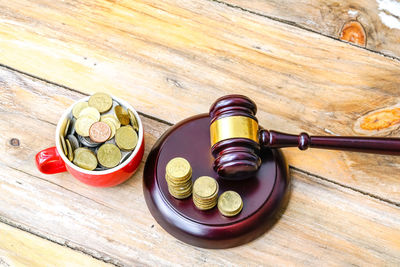 High angle view of coins on table