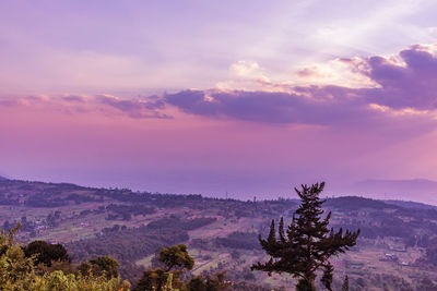 Scenic view of landscape against sky during sunset