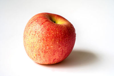 Close-up of apple against white background