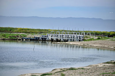 Scenic view of river against sky