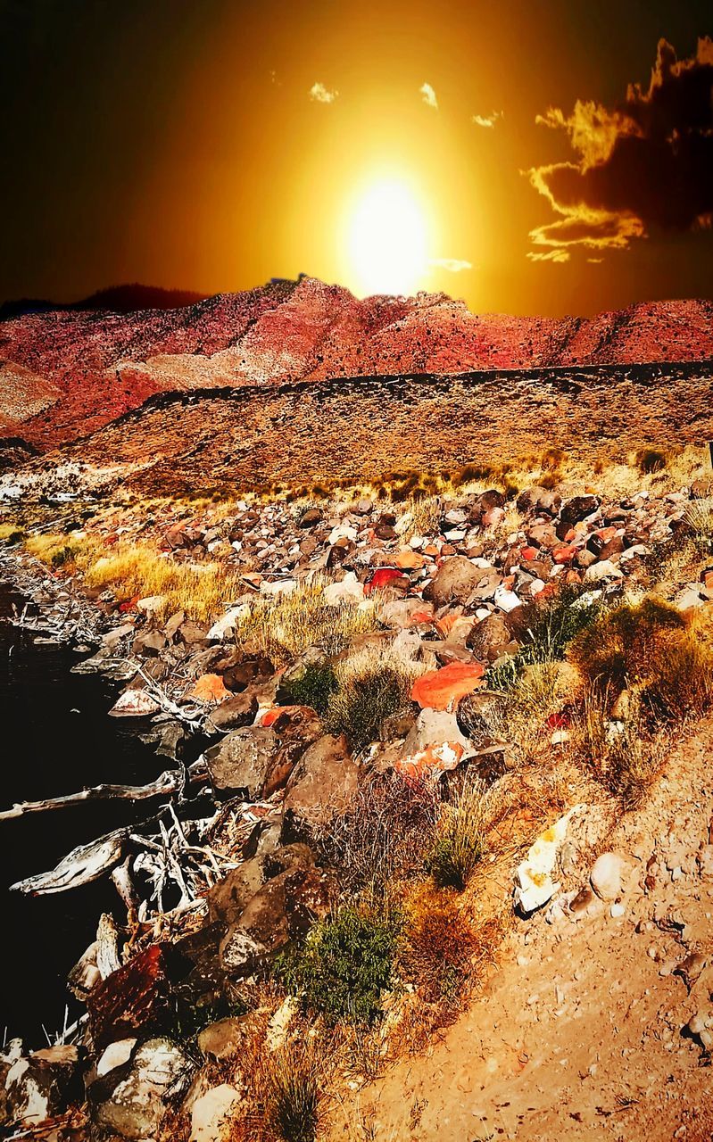 SCENIC VIEW OF LANDSCAPE AGAINST SKY AT SUNSET