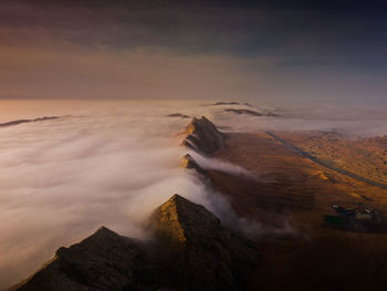 Scenic view of mountains against sky during sunset