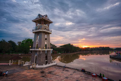 Scenic view of lake against sky during sunset