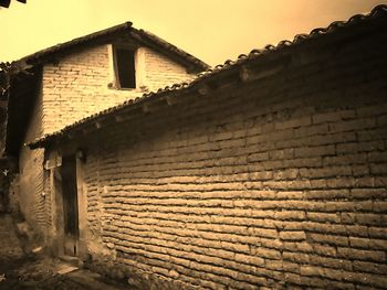 Abandoned building against clear sky