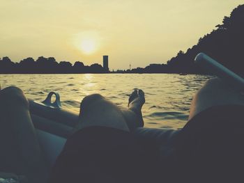 People relaxing at sunset