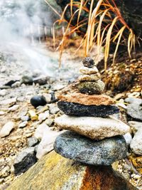 Close-up of stone stack on rock