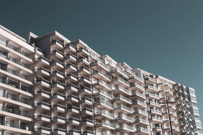 Low angle view of modern building against clear sky