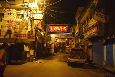 View of illuminated street at night