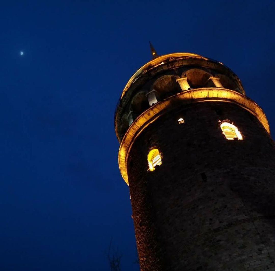 low angle view, architecture, night, travel, tower, sky, religion, travel destinations, history, no people, astronomy, moon, place of worship, outdoors, clock