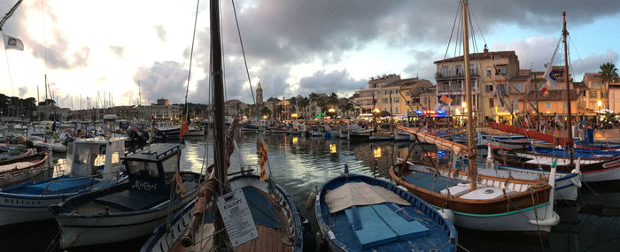 Panoramic view of harbor and buildings in city